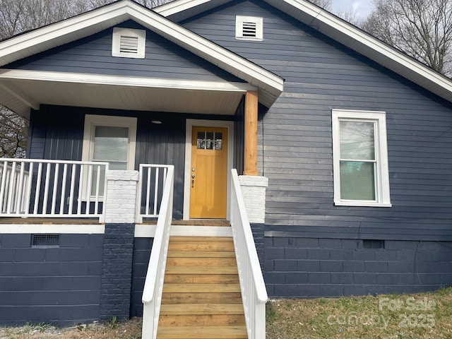 216 N Vance St, Gastonia, NC 28052 - entrance to property featuring crawl space and covered porch