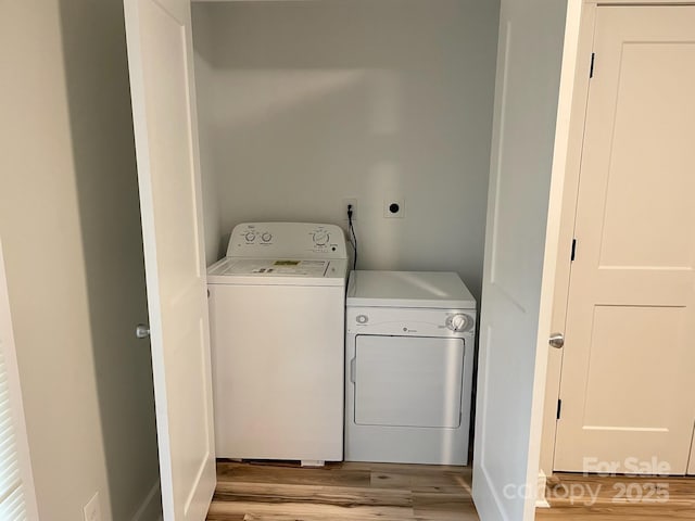216 N Vance St, Gastonia, NC 28052 - laundry area with separate washer and dryer and wood finished floors