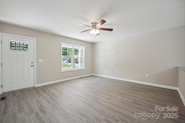 528 S Caldwell St, Salisbury, NC 28144 - entrance foyer with a ceiling fan and wood finished floors