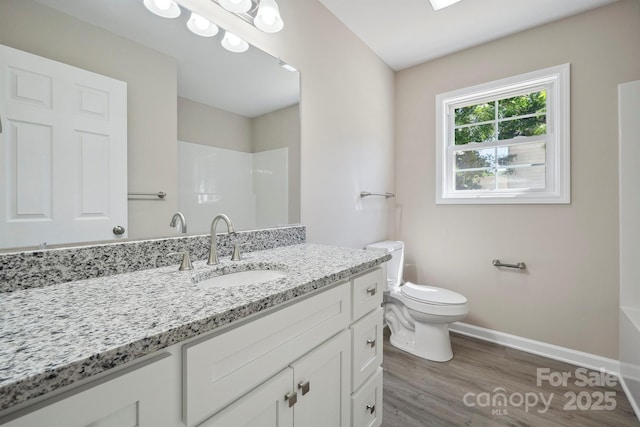 528 S Caldwell St, Salisbury, NC 28144 - full bath with vanity, wood finished floors, and a shower