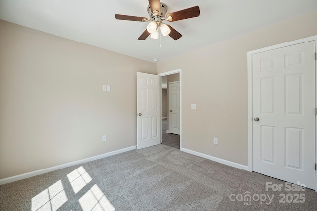 528 S Caldwell St, Salisbury, NC 28144 - unfurnished bedroom with light carpet and a ceiling fan