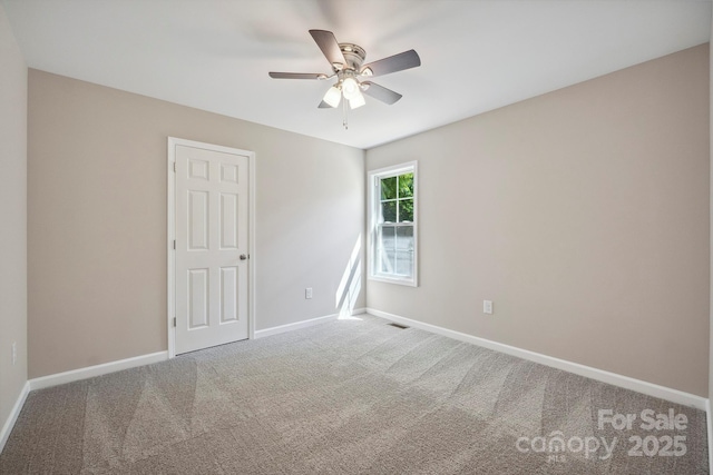 528 S Caldwell St, Salisbury, NC 28144 - carpeted spare room with a ceiling fan and baseboards