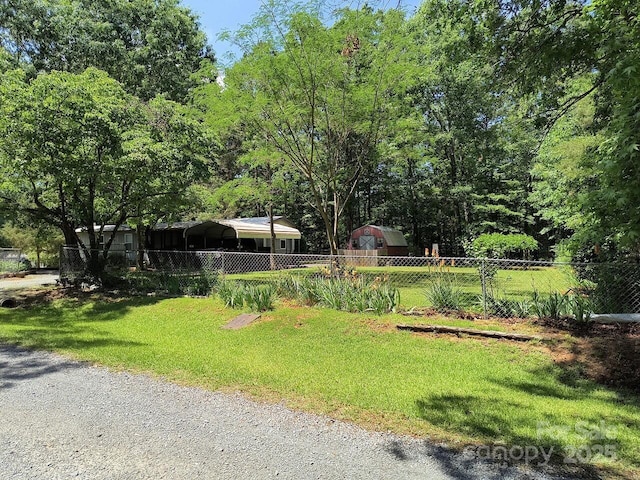 view of yard with a detached carport