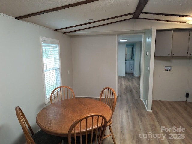 dining room with light wood finished floors