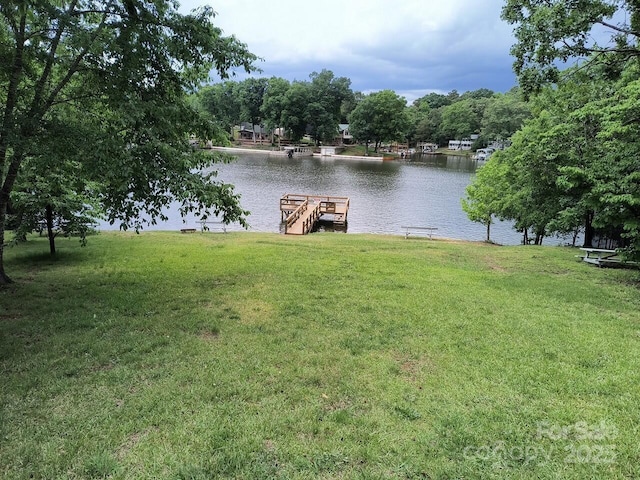 water view featuring a dock