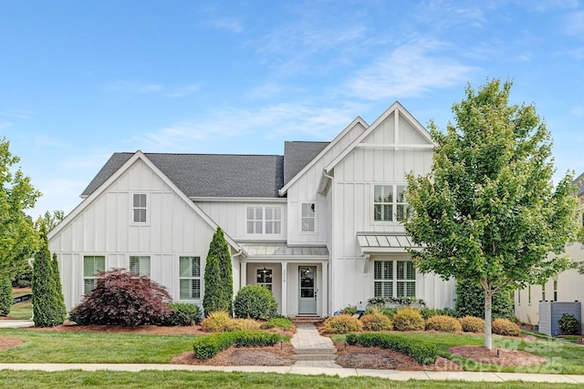 2026 Thatcher Way, Fort Mill, SC 29715 - modern farmhouse with board and batten siding, a standing seam roof, and roof with shingles