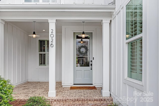 2026 Thatcher Way, Fort Mill, SC 29715 - entrance to property with board and batten siding and ceiling fan
