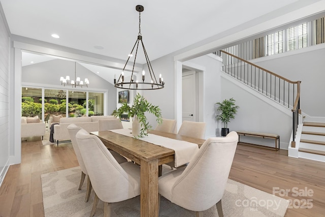 2026 Thatcher Way, Fort Mill, SC 29715 - dining space with a chandelier, light wood finished floors, stairs, vaulted ceiling, and recessed lighting