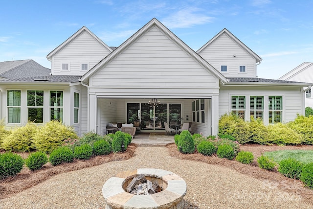 2026 Thatcher Way, Fort Mill, SC 29715 - back of property featuring a fire pit, a patio area, and roof with shingles