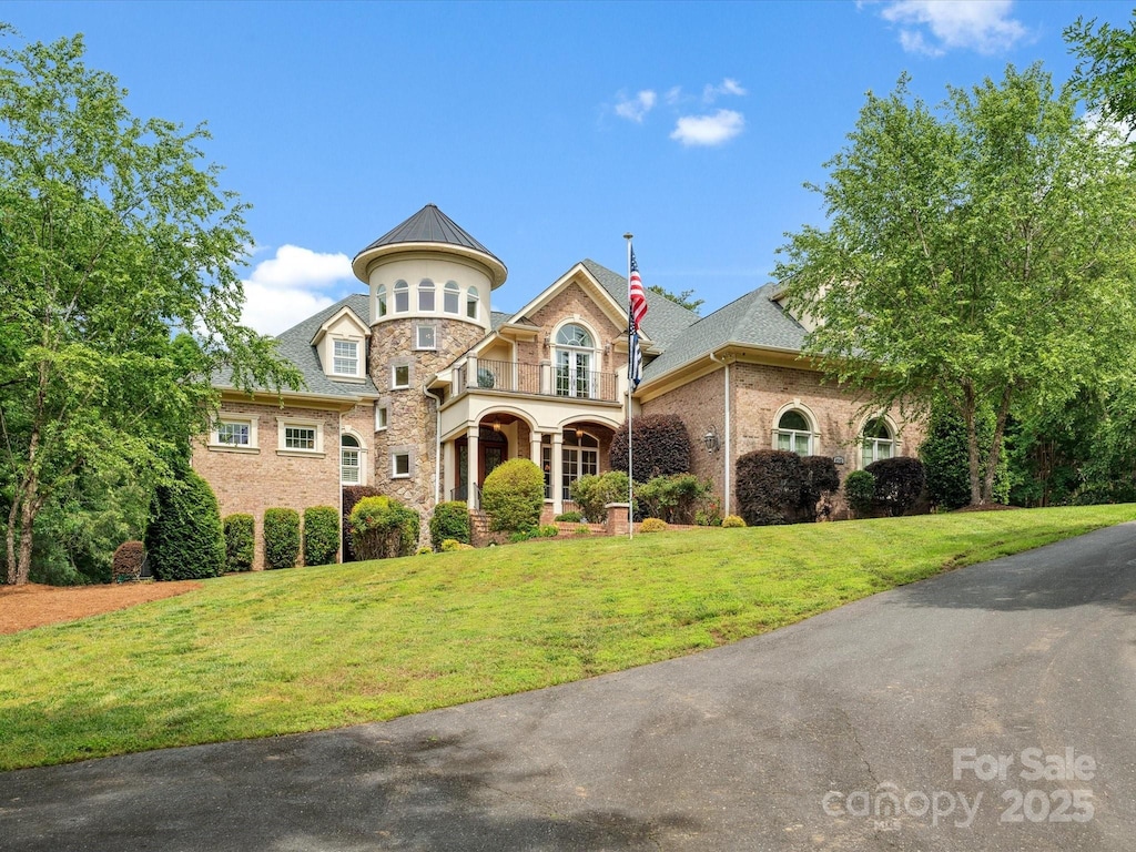 6742 Charlotte Hwy, York, SC 29745 - french country home featuring a front yard, a standing seam roof, and stone siding