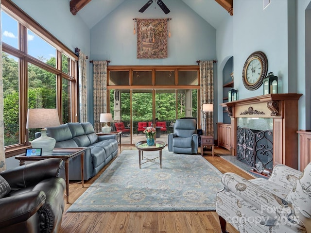 6742 Charlotte Hwy, York, SC 29745 - living area with high vaulted ceiling, wood finished floors, a fireplace, and beamed ceiling