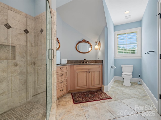 6742 Charlotte Hwy, York, SC 29745 - bathroom featuring a stall shower, vanity, toilet, and tile patterned floors
