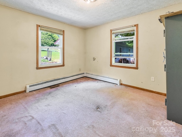 522 Bailey Mountain Rd, Mars Hill, NC 28754 - unfurnished room with carpet, a textured ceiling, baseboards, and baseboard heating