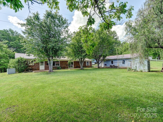 522 Bailey Mountain Rd, Mars Hill, NC 28754 - view of green lawn with an outbuilding
