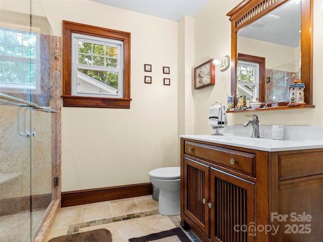 6 Woodley Ave, Asheville, NC 28804 - bathroom with tile patterned flooring, a shower stall, baseboards, and plenty of natural light
