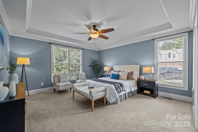 389 Ponderosa Cir, Mooresville, NC 28117 - bedroom featuring a raised ceiling, multiple windows, ornamental molding, and light carpet