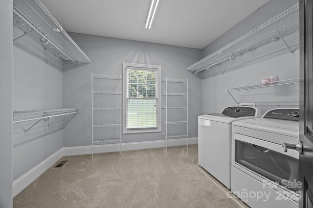 389 Ponderosa Cir, Mooresville, NC 28117 - washroom featuring washing machine and clothes dryer, light carpet, and baseboards