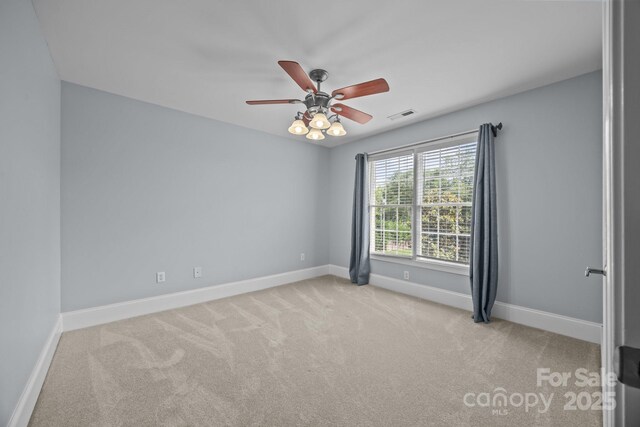 389 Ponderosa Cir, Mooresville, NC 28117 - carpeted spare room featuring a ceiling fan and baseboards