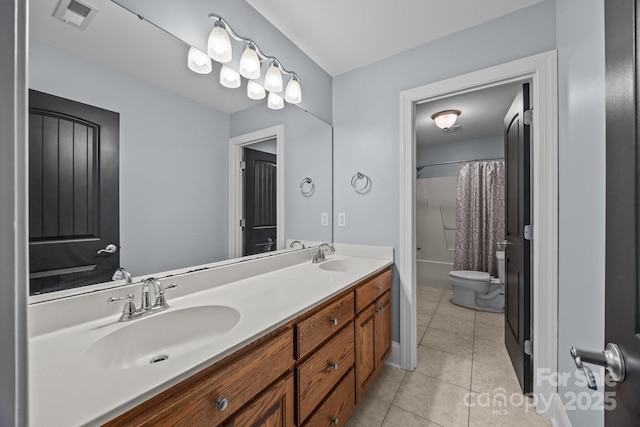 389 Ponderosa Cir, Mooresville, NC 28117 - bathroom featuring double vanity, toilet, tile patterned floors, and shower / bath combo