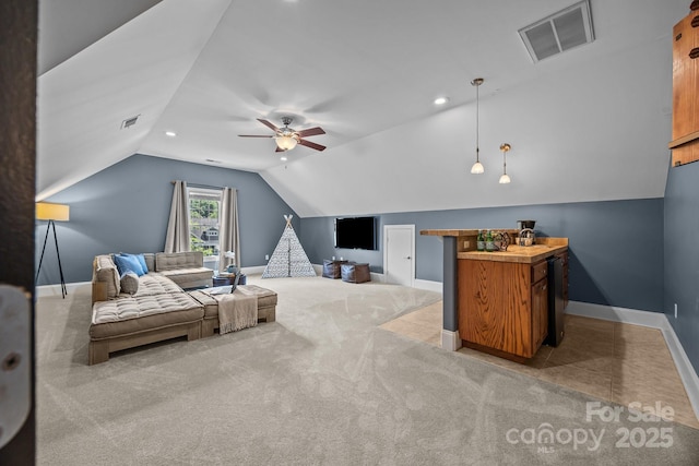 389 Ponderosa Cir, Mooresville, NC 28117 - carpeted living area featuring vaulted ceiling, baseboards, a ceiling fan, and recessed lighting