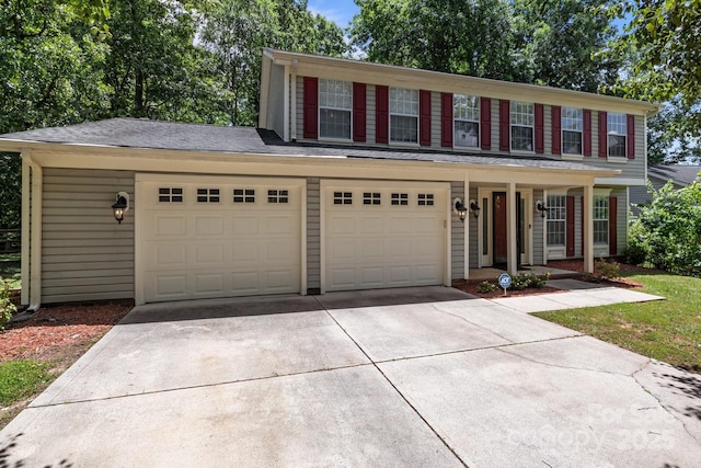 10327 Shelter Rock Ct, Charlotte, NC 28214 - colonial home with concrete driveway, covered porch, and an attached garage