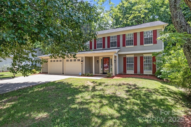 10327 Shelter Rock Ct, Charlotte, NC 28214 - view of front facade featuring an attached garage, concrete driveway, a front yard, and covered porch