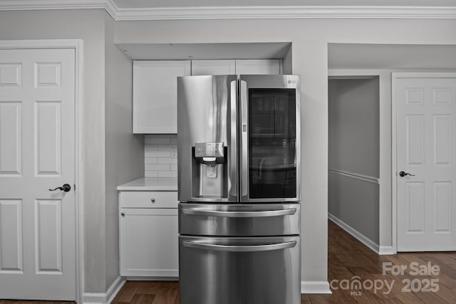 10327 Shelter Rock Ct, Charlotte, NC 28214 - kitchen with stainless steel fridge, dark wood-style flooring, white cabinetry, light countertops, and baseboards