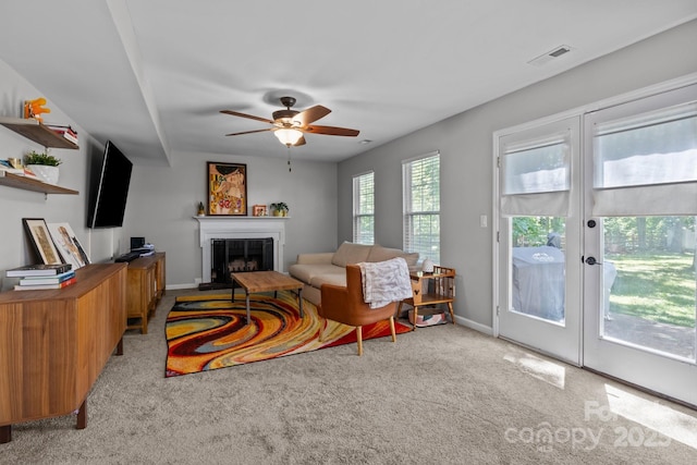 10327 Shelter Rock Ct, Charlotte, NC 28214 - carpeted living area featuring ceiling fan, a fireplace, and baseboards