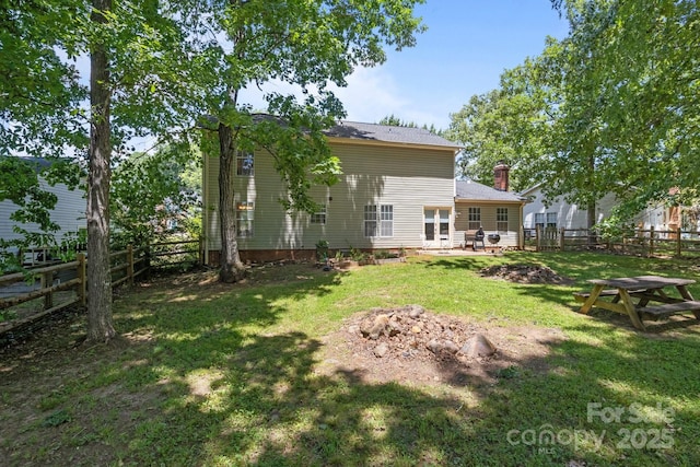 10327 Shelter Rock Ct, Charlotte, NC 28214 - rear view of house featuring a chimney and a patio area
