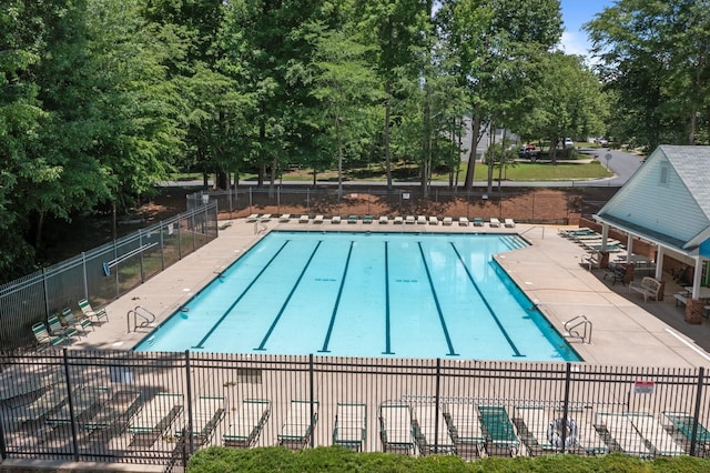 10327 Shelter Rock Ct, Charlotte, NC 28214 - community pool with a patio area and view of scattered trees