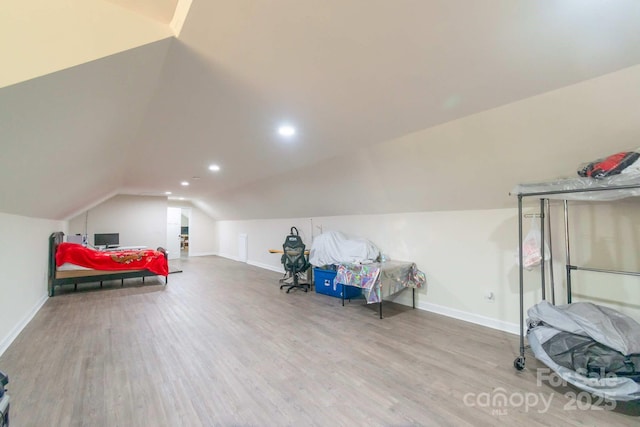 1811 Continental Dr, Albemarle, NC 28001 - bedroom featuring vaulted ceiling, wood finished floors, baseboards, and recessed lighting