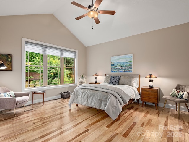 4 Alsatian Ln, Asheville, NC 28805 - bedroom with light wood finished floors, lofted ceiling, baseboards, and a ceiling fan