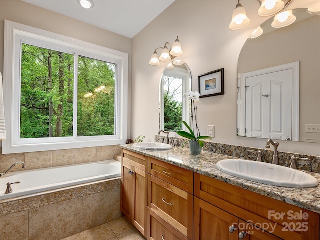 4 Alsatian Ln, Asheville, NC 28805 - full bath with a garden tub, tile patterned flooring, and double vanity