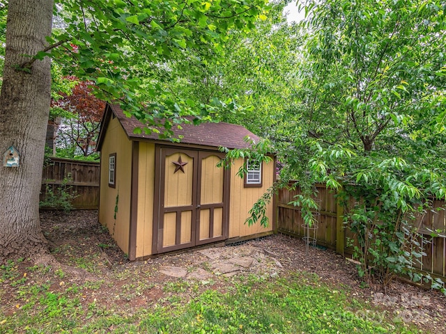4 Alsatian Ln, Asheville, NC 28805 - view of shed with a fenced backyard