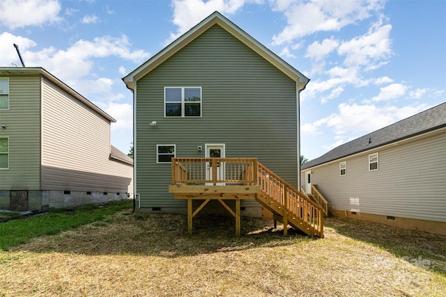 back of property with crawl space, stairs, and a wooden deck