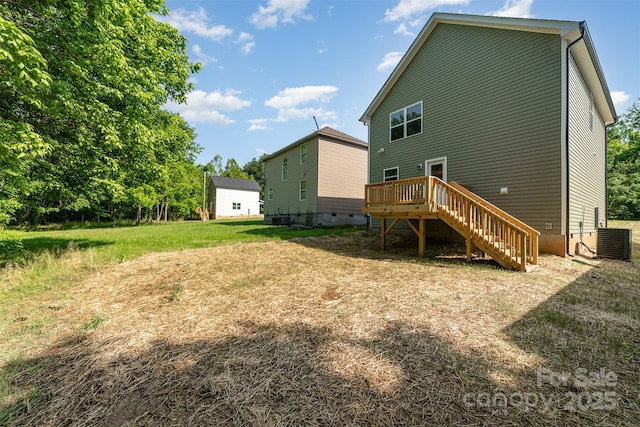 back of property featuring a wooden deck, central AC unit, and stairs
