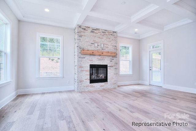 20392 Queens St, Cornelius, NC 28031 - unfurnished living room with coffered ceiling, light wood finished floors, a fireplace, beam ceiling, and ornamental molding