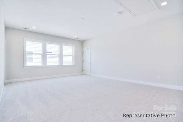 20392 Queens St, Cornelius, NC 28031 - empty room with attic access, light carpet, and recessed lighting