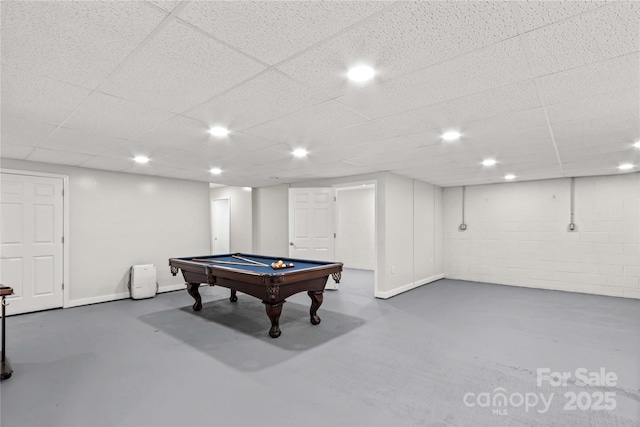 rec room with concrete floors, billiards table, recessed lighting, and a paneled ceiling