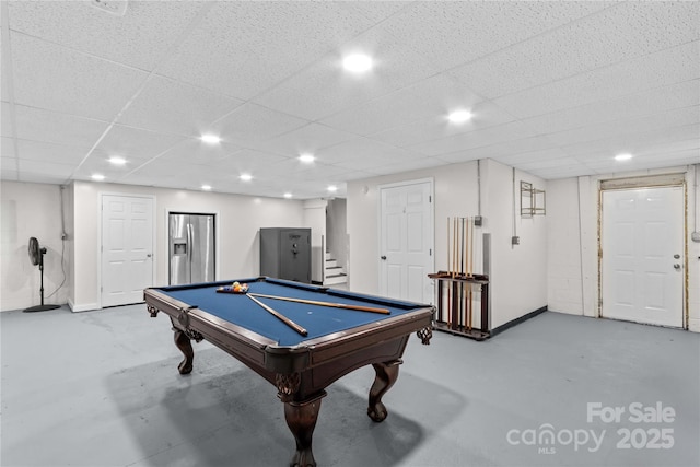 playroom with concrete floors, pool table, baseboards, recessed lighting, and a paneled ceiling