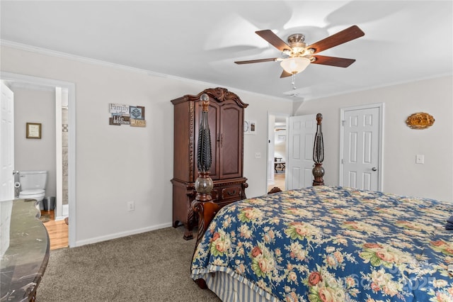 carpeted bedroom featuring ornamental molding, ceiling fan, baseboards, and connected bathroom