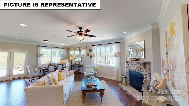 living area with wood finished floors, recessed lighting, crown molding, baseboards, and a fireplace