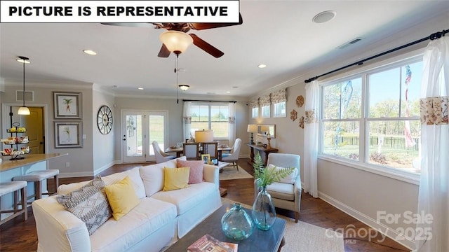 living area with baseboards, ornamental molding, a ceiling fan, wood finished floors, and recessed lighting
