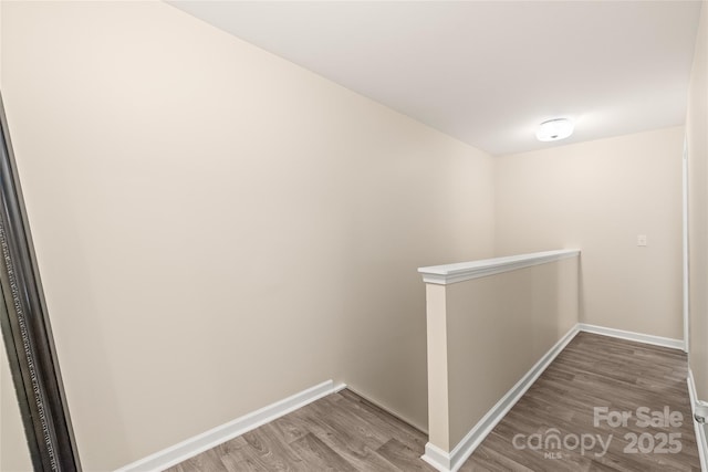13221 Gadwal Pintail Dr, Charlotte, NC 28262 - corridor featuring an upstairs landing, wood finished floors, and baseboards