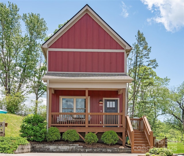 104 Wheeler Rd, Weaverville, NC 28787 - view of front of house with covered porch, board and batten siding, a shingled roof, and stairs