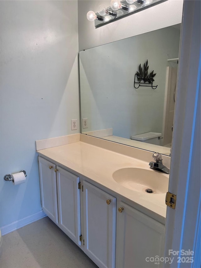 303 Eastwood Dr, Salisbury, NC 28146 - bathroom with vanity, baseboards, and toilet