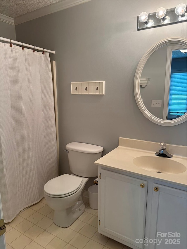 303 Eastwood Dr, Salisbury, NC 28146 - bathroom with crown molding, vanity, toilet, tile patterned floors, and a textured ceiling