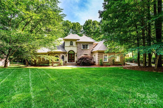 122 Sleepy Cove Trl, Mooresville, NC 28117 - view of front of property with a front lawn, french doors, and brick siding