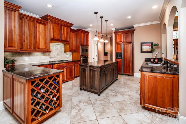 122 Sleepy Cove Trl, Mooresville, NC 28117 - kitchen with stainless steel appliances, arched walkways, ornamental molding, a peninsula, and decorative backsplash