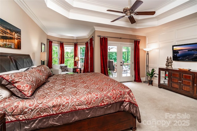 122 Sleepy Cove Trl, Mooresville, NC 28117 - bedroom featuring access to outside, carpet flooring, crown molding, french doors, and a tray ceiling
